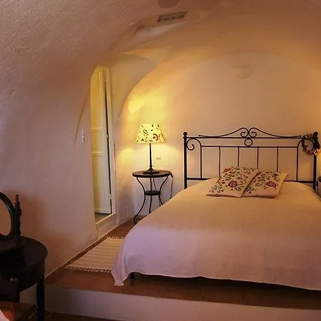 Aris Caves * Oia